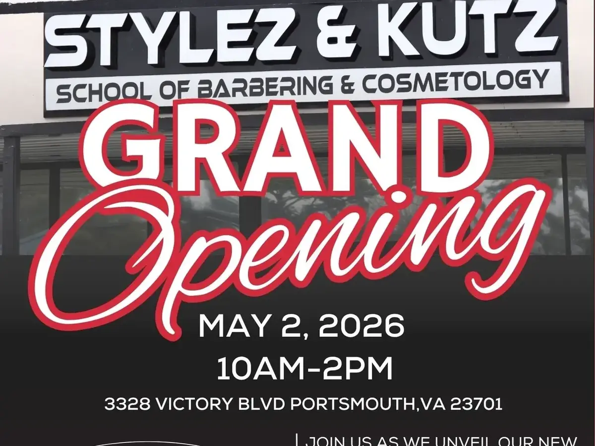 Front of the Stylez & Kutz School of Barbering & Cosmetology storefront with a large Grand Opening banner displaying the address 3328 Victory Blvd, Portsmouth, VA 23701.